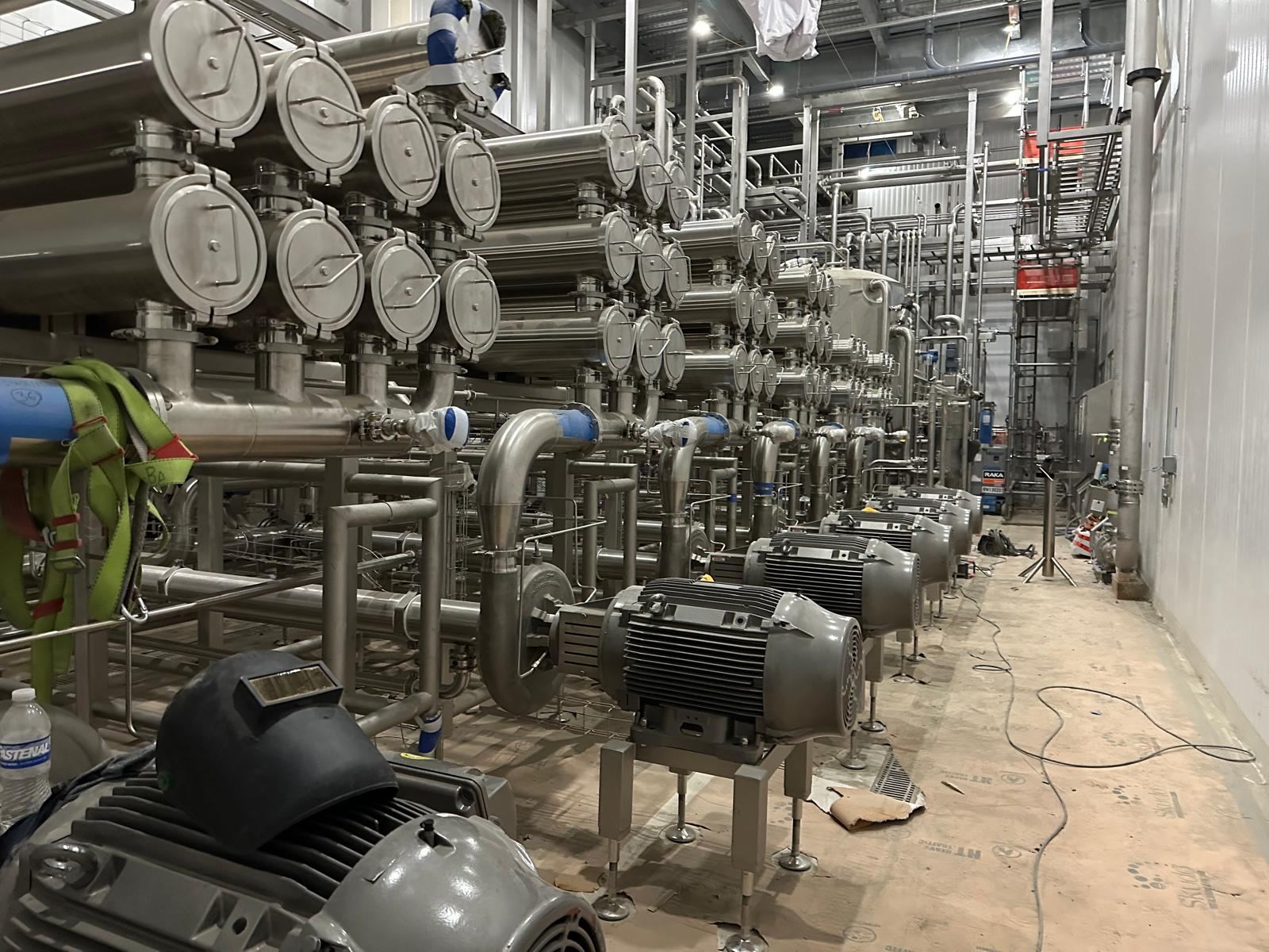 Heat exchangers and stainless piping with pumps